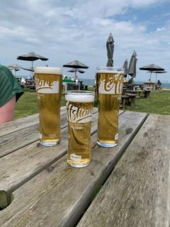 Well deserved refreshments at The Ship Inn at Mundesley after winning the race against the tide